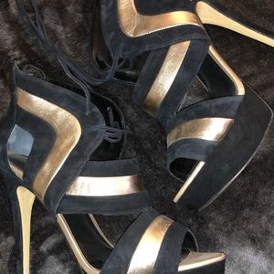 Guess black and gold heels.